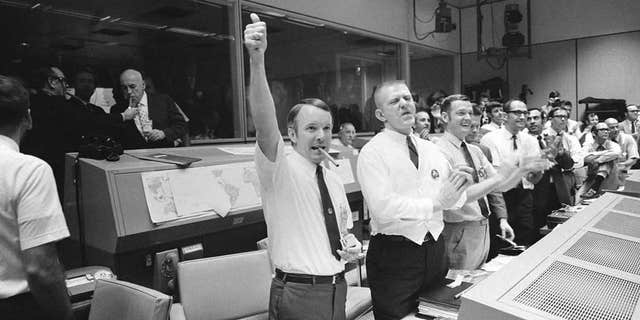 Mission Control celebrates the Apollo 13 splashdown.