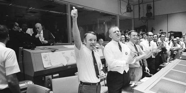 Mission Control celebrates the crash of Apollo 13.