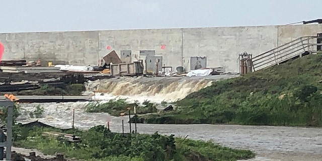Water going over the levee at Point Celeste Pumping Station in Louisiana as Hurricane Barry makes its way to land.