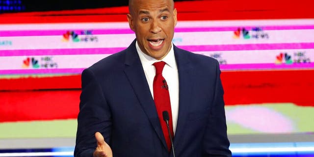 Democratic presidential candidate Sen. Cory Booker, D-N.J., speaks at a Democratic primary debate hosted by NBC News at the Adrienne Arsht Center for the Performing Art, Wednesday, June 26, 2019, in Miami. (AP Photo/Wilfredo Lee)