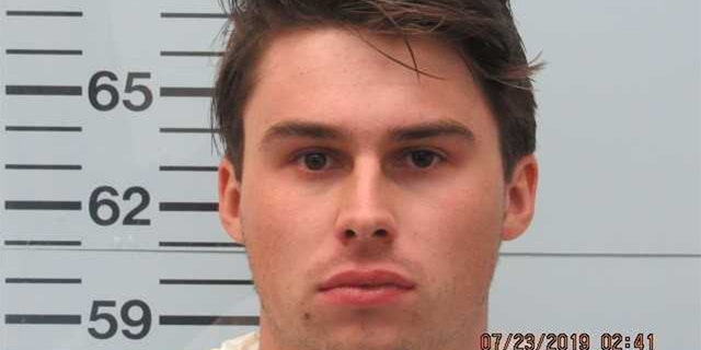 Brandon Theesfeld was arrested on a murder charge, investigators confirmed Tuesday.
