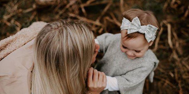 Brittany Calden and her daughter playing together. Calden captured a "heartwarming" moment at Chick-fil-A when an employee prayed for a customer.