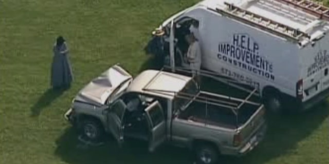 A horse-drawn carriage, carrying six people, was headed to a blueberry patch in Missouri.
