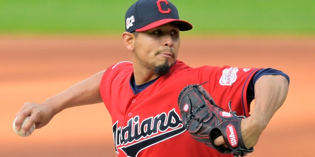 Apr 23, 2019; Cleveland, OH, USA; Cleveland Indians starting pitcher Carlos Carrasco (59) throws against the Miami Marlins in the third inning at Progressive Field.
