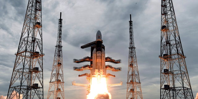 This photo released by the Indian Space Research Organization (ISRO) shows its Geosynchronous Satellite launch Vehicle (GSLV) MkIII carrying Chandrayaan-2 lift off from Satish Dhawan Space center in Sriharikota, India, Monday, July 22, 2019. India successfully launched an unmanned spacecraft to the far side of the moon on Monday, a week after aborting the mission due to a technical problem.