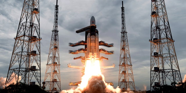 This photo released by the Indian Space Research Organization (ISRO) shows its Geosynchronous Satellite launch Vehicle (GSLV) MkIII carrying Chandrayaan-2 lift off from Satish Dhawan Space center in Sriharikota, India, Monday, July 22, 2019. India successfully launched an unmanned spacecraft to the far side of the moon on Monday, a week after aborting the mission due to a technical problem.