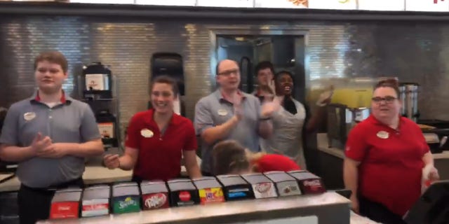 Customers and staff joined the song to impressively sing Bill Withers' "Lean on Me" group.