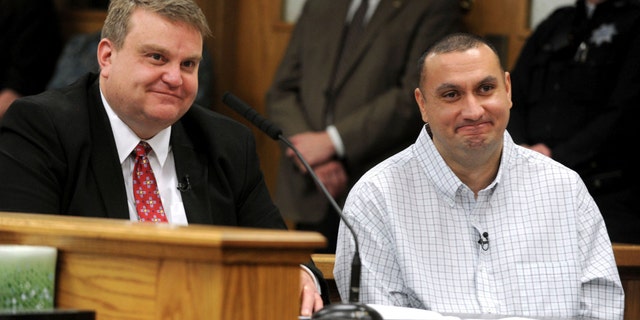 Christopher Tapp, right, and public defender John Thomas at Tapp's hearing Wednesday in Idaho Falls, Idaho. (Taylor Carpenter/Post Register via AP, Pool)
