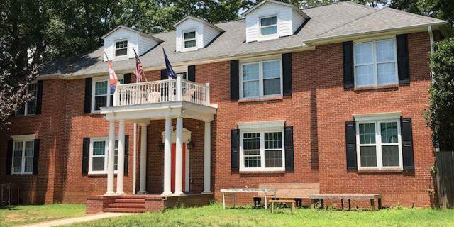 A Clemson University student died early Sunday after falling off the roof of a home, according to officials.