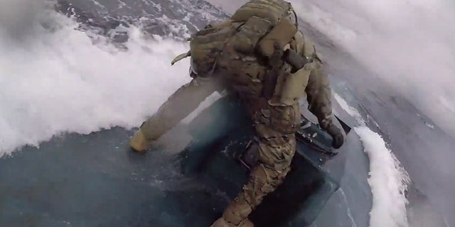 The Coast Guard released dramatic video on Thursday of service members jumping onto a moving drug smuggling vessel that was carrying about 17,000 pounds of cocaine.