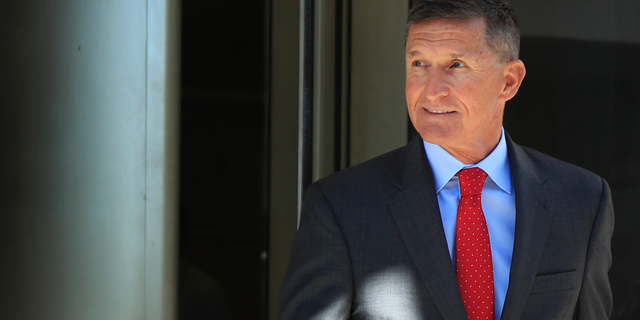 FILE - In this July 10, 2018, file photo, former Trump national security adviser Michael Flynn leaves the federal courthouse in Washington, following a status hearing. (AP Photo/Manuel Balce Ceneta, File)