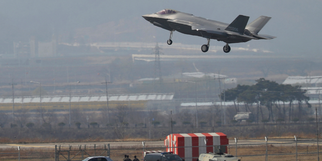 In this March 29, 2019, photo, a U.S. F-35A fighter jet prepares to land at Chungju Air Base in Chungju, South Korea. (Kang Jong-min/Newsis via AP)