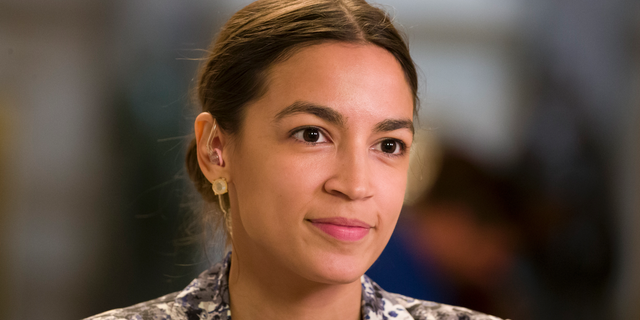 Rep. Alexandria Ocasio-Cortez, D-N.Y., prepares to do a television interview on Capitol Hill. (AP Photo/Alex Brandon)