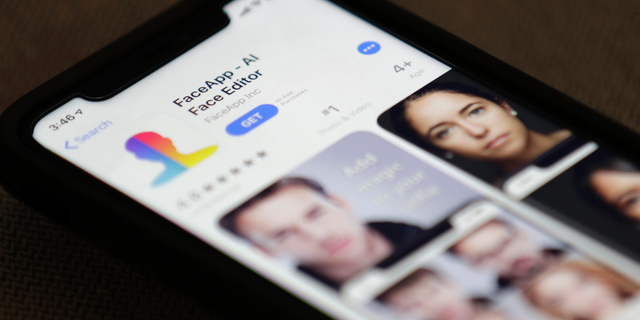 FaceApp is displayed on an iPhone Wednesday, July 17, 2019, in New York. (AP Photo/Jenny Kane)