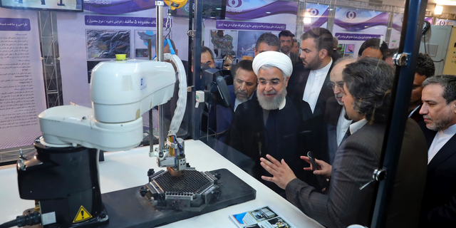 Iranian President Hassan Rouhani said this past May that the country would exceed the nuclear deal's limitations on stockpiling uranium. (Iranian Presidency Office via AP, File)
