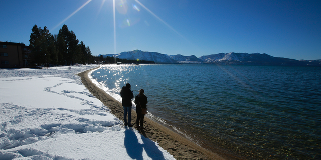 Lake Tahoe sits on the California-Nevada border and California’s order doesn’t apply to the Nevada side. (AP Photo/Rich Pedroncelli, File)