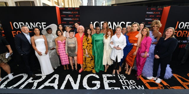 The cast including Selenis Leyva, Danielle Brooks, Diane Guerrero, Beth Dover, Jason Biggs, Jackie Cruz, Uzo Aduba, Alysia Reiner, Natasha Lyonne, Jessica Pimentel, Taylor Schilling, Laura Prepon, and Laverne Cox attend the 'Orange Is the New Black' Season 7 premiere in NYC on July 25.