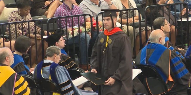 McLaughlin after receiving his degree during the ceremony.