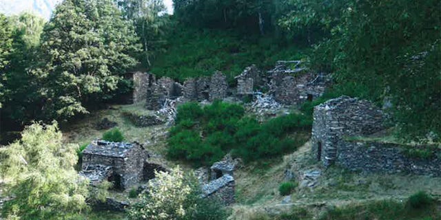 Stone houses, largely in ruins, in Monti Scìaga, a hamlet of the village Indemini. The local government is considering selling houses in Monti Scìaga for one Swiss franc each, an effort to bring people back to the area, which has been abandoned since the 1970s.