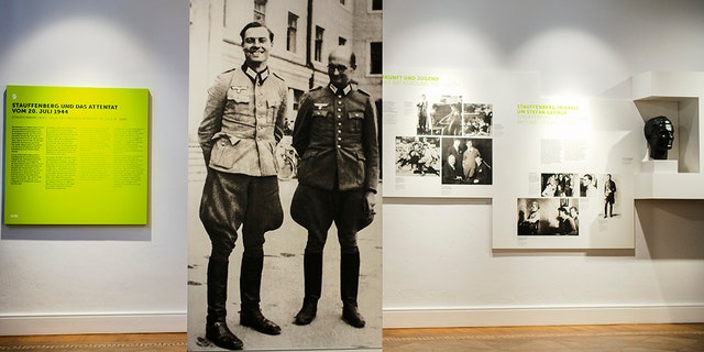 On this Friday, July 12, 2019, a picture of Claus Schenk Graf von Stauffenberg, left, and Albrecht Ritter Merz von Quirnheim is displayed at the exhibition at the German Resistance Memorial Center inside the Bendlerblock building of the defensive ministry in Berlin. Stauffenberg was one of the leaders of the failed assassination to Adolf Hitler one July 20, 1944. (AP Photo/Markus Schreiber)