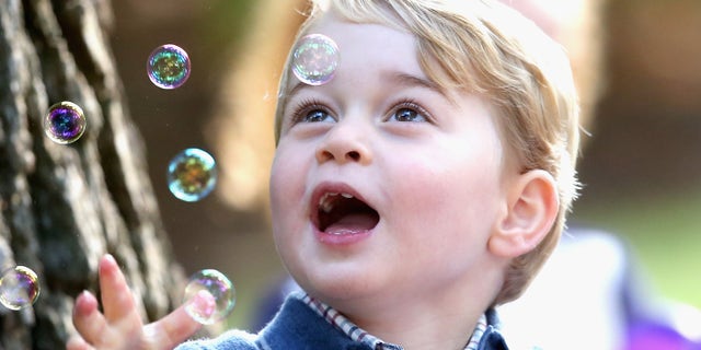 Prince George of Cambridge plays with bubbles at a children's party for Military families during the Royal Tour of Canada on Sept. 29, 2016 in Victoria, Canada.