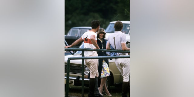 Prince Charles chats to Camilla Parker-Bowles at a polo match. (Photo by © Hulton-Deutsch Collection/CORBIS/Corbis via Getty Images)