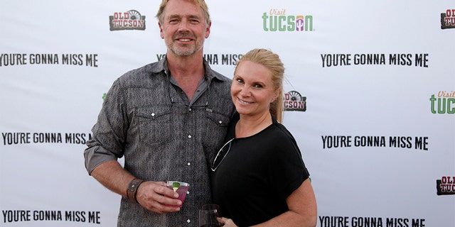 John Schneider and Alicia Allain attend 