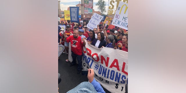 Presidential candidate Kamala Harris marches with McDonald's workers protesting for a $15 minimum wage in Las Vegas.