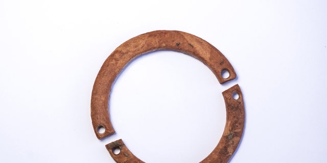 A bracelet found at the site. The size of the bracelets discovered indicates that they were probably given to children. (Photo: Yaniv Berman, Israel Antiquities Authority)