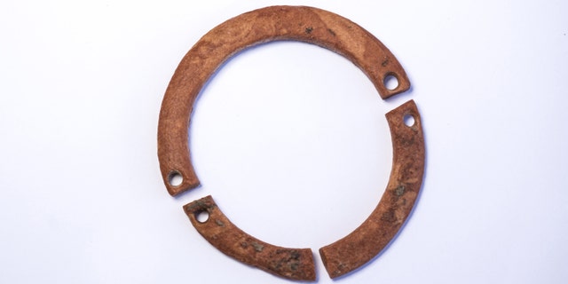 A bracelet found at the site. The size of the bracelets discovered indicates that they were probably given to children. (Photo: Yaniv Berman, Israel Antiquities Authority)