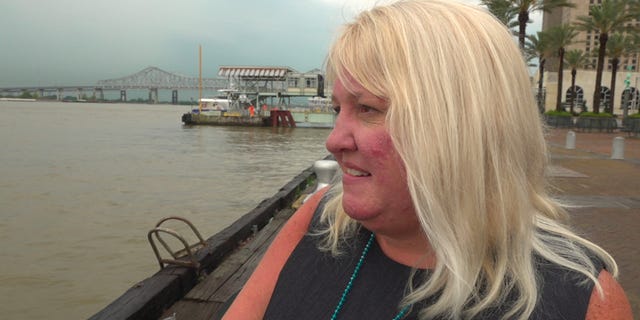 New Orleans resident Jena Smith looks out at the Mississippi River Wednesday. (Fox News/ Charles Watson)