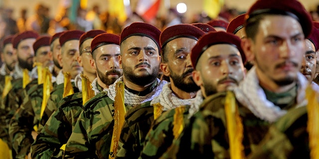 31 May 2019, Lebanon, Beirut: Pro-Iranian Hezbollah fighter take part in a parade to mark the annual al-Quds Day (Jerusalem Day) on the last Friday of the Muslim holy month of Ramadan.