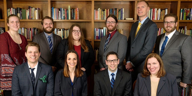 The legal staff of the Freedom from Religion Foundation, which says it plans to file an amicus curiae brief with the Supreme Court supporting the Montana decision in Espinoza v. Montana Department of Revenue. Patrick Elliott, who spoke with Fox News, sits in the bottom row, second from the right. (FFRF)