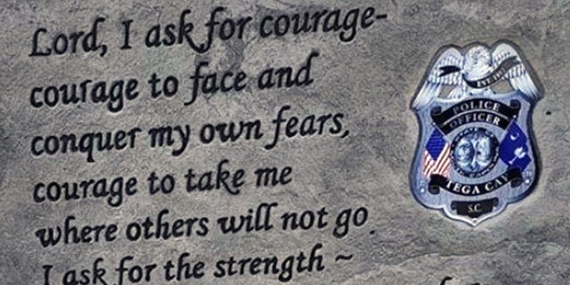 The City of Tega Cay, S.C. is bringing back the Fallen Police Officer Monument it removed but not including a Bible verse reference is upsetting residents.