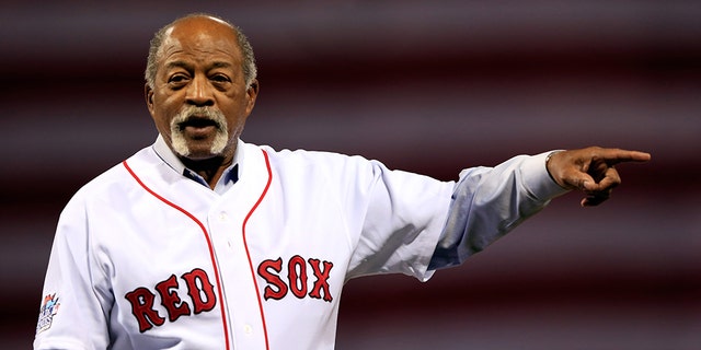 Former Boston Red Sox player Luis Tiant waves to the crowd before Game One of the 2013 World Series between the Boston Red Sox and the St. Louis Cardinals at Fenway Park on October 23, 2013 in Boston, Massachusetts. (Photo by Jamie Squire/Getty Images)