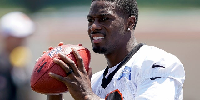 Cincinnati Bengal wide receiver A.J. Green (18) catches a pass during the first day of NFL football training camp in Dayton, Ohio, Saturday, July 27, 2019, in Dayton, Ohio. (AP Photo/Bryan Woolston)