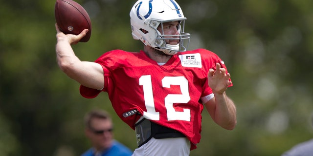 Indianapolis Colts quarterback Andrew Luck (12) throws during practice at the NFL team's football training camp in Westfield, Ind., Sunday, July 28, 2019. (AP Photo/Michael Conroy)
