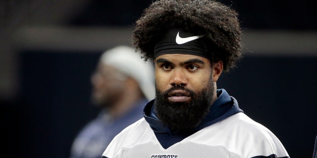 Dallas Cowboys running back Ezekiel Elliottwalks off the field after NFL football practice in Frisco, Texas (AP Photo/Michael Ainsworth, file)