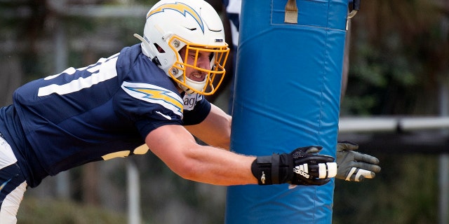 Los Angeles Chargers defensive end Joey Bosa runs a drill during an NFL football training camp in Costa Mesa, Calif., Monday, July 29, 2019. (AP Photo/Kyusung Gong)
