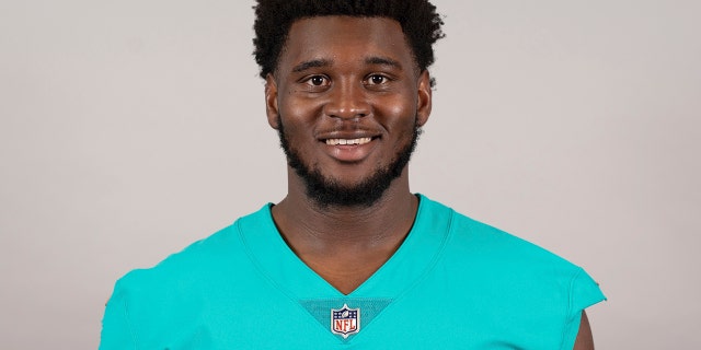 FILE - This is a 2019 file photo showing Kendrick Norton of the Miami Dolphins NFL football team. Dolphins defensive tackle Kendrick Norton suffered multiple injuries in a car crash near Miami that required his left arm to be amputated. Sports agent Malki Kawa confirmed the injuries in a tweet on Thursday morning, July 4, 2019. (AP Photo/File)