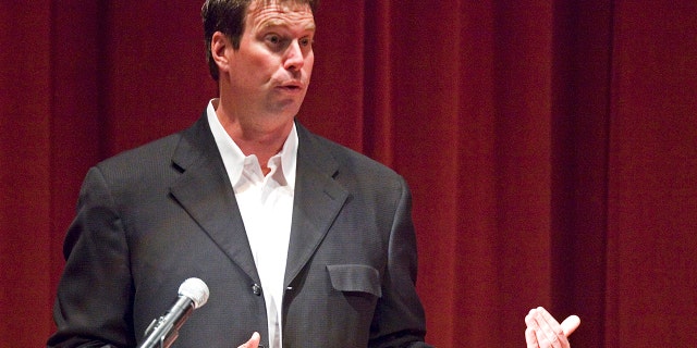 ESPN hired Ryan Leaf as a college football analyst, which is another milestone in the remarkable return of the former Washington State star who fought against drug addiction and spent in jail. (Dean Hare / Moscow-Pullman Daily News via AP, File)