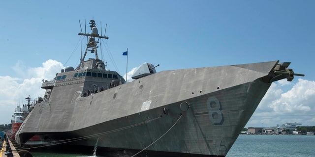 The Independence-variant littoral combat ship USS Montgomery (LCS 8) sits pierside at Changi Naval Base, Singapore, in 2019, after arriving for a rotational deployment. 