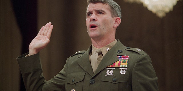 Lt. Col. Oliver North being sworn in on his first day of testimony at the Iran Contra hearings in July 1987.