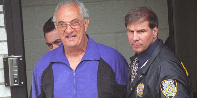 Peter Gotti, left, is seen after he and 17 other Gambino family mobsters were arrested and transported to a federal court for arraignment, June 4, 2002.