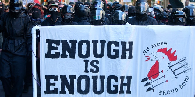 A version of the three-arrow "Iron Front" symbol used by some Antifa supporters is seen during a demonstration in downtown Portland, Ore., June 29, 2019. (Associated Press)