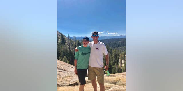Paul with his son, Riley.