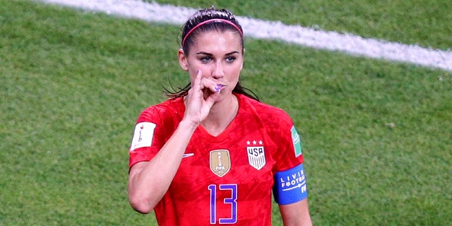 Alex Morgan has been criticized for his celebration of "tea". (AP Photo / François Mori)