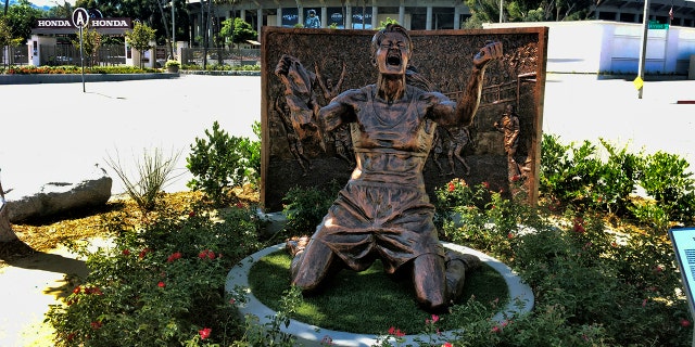 A statue capturing Brandi Chastain's iconic reaction to scoring the U.S. team's winning goal in the 1999 Women's World Cup, is shown after being unveiled outside the Rose Bowl in Pasadena, Calif., Wednesday, July 10, 2019. (AP Photo/John Antczak)