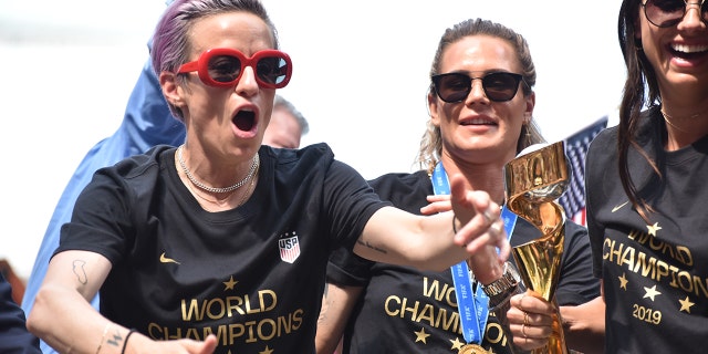 Megan Rapinoe celebrates with her teammates.
