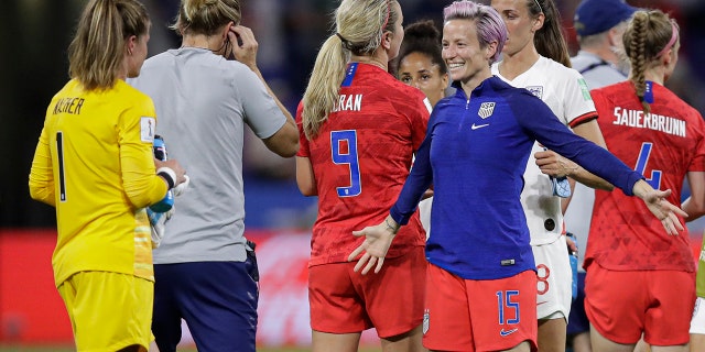 United States' Megan Rapinoe prepares to hug United States goalkeeper Alyssa Naeher after the Women's World Cup semifinal soccer match between England and the United States, at the Stade de Lyon, outside Lyon, France, Tuesday, July 2, 2019. (AP Photo/Alessandra Tarantino)